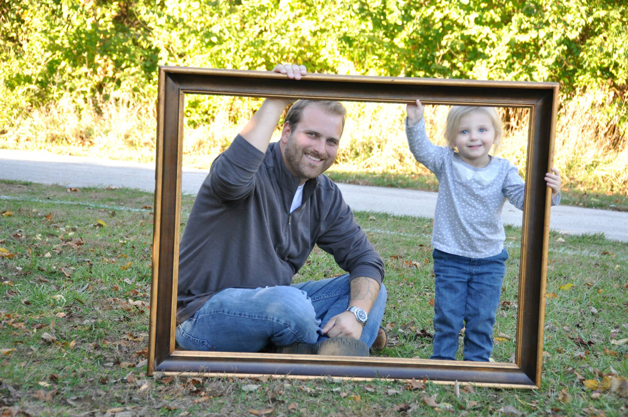 Author, Jason Mills taking a photo with his daughter, Hanabella Mills