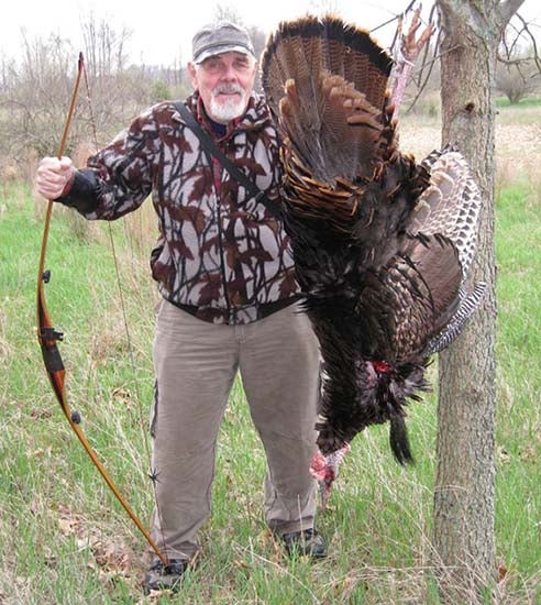 Denny Sturgis Sr with turkey taken with a longbow