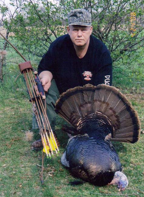 Gary Boals takes a nice tom turkey with a bow