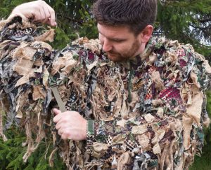 Cinch down all straps on your ghillie suit for maximum mobility