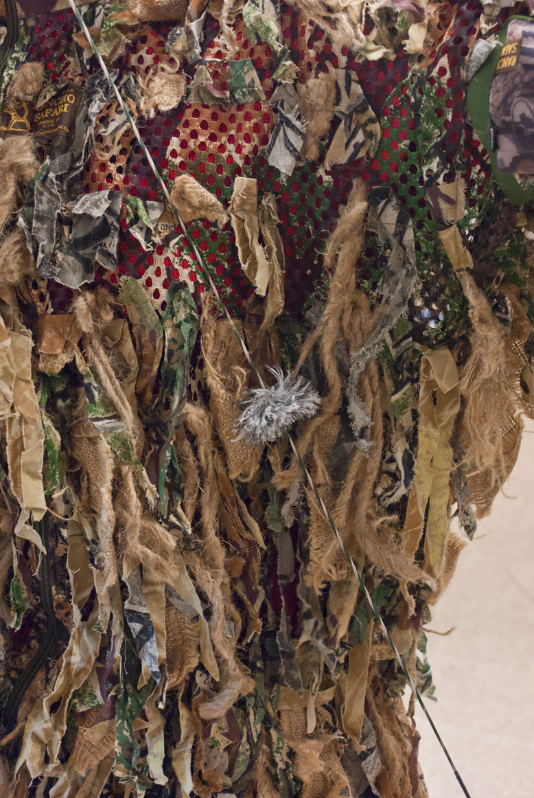 Ghillie suits normally catch the bow string in the chest area