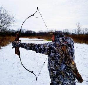 Denny Sturgis Jr showing a clicker on his hunting recurve bow