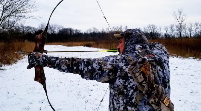 Denny Sturgis Jr showing a clicker on his hunting recurve bow