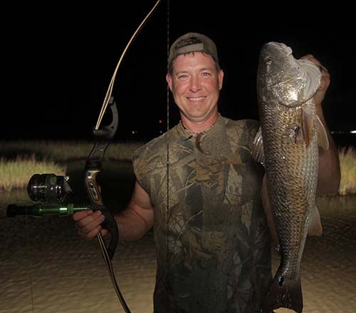 Fred showing off a Muzzy bowfishing reel effectiveness