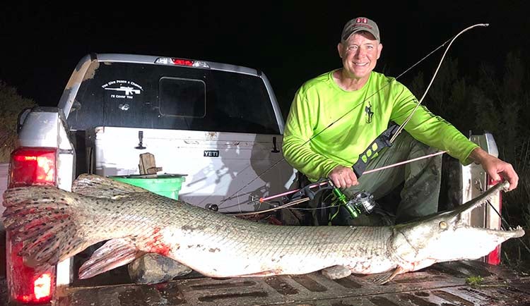 Fred with a monster he took with his recurve bow