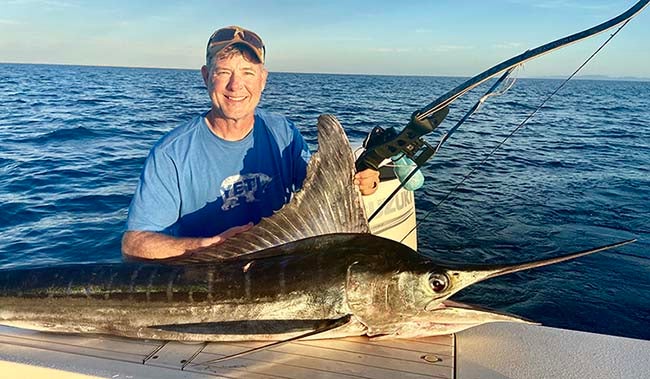 Fred bowfishing on a family trip to Mexico