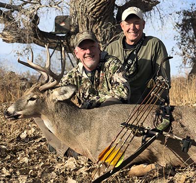 Gorgeous buck with a happy bowhunter. 