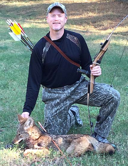 Gregg Garrison with coyote