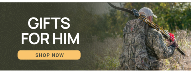 A bow stave in a vice being worked on with a rasp